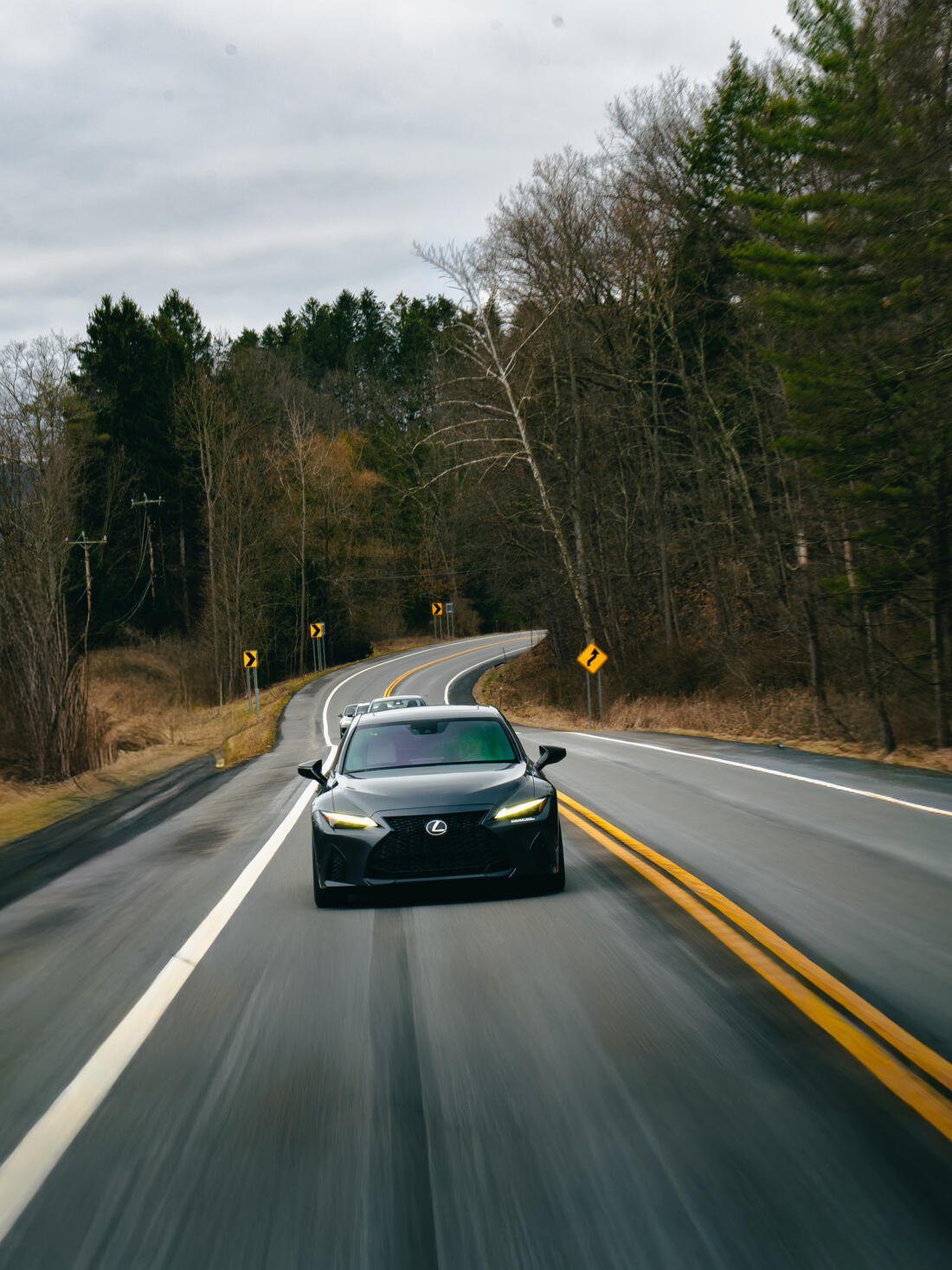 A club car at speed on the road down to the Glen